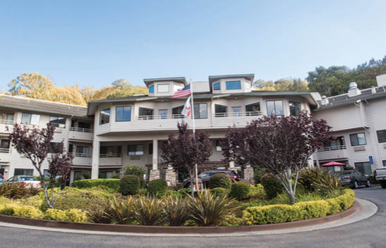 A large building with a flag on the roof. AI generated content